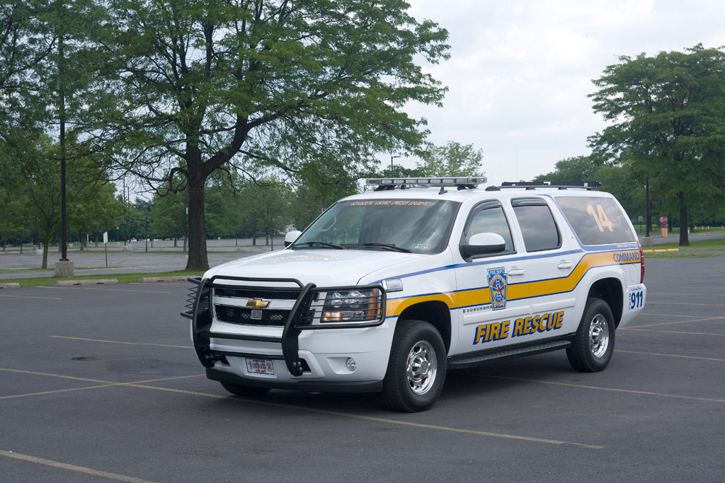  1443 is a 2007 Chevy Suburban customized by Odyssey Automotive.