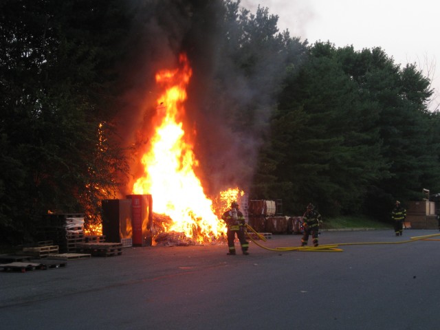 Engine goes to work on a rubbish fire.