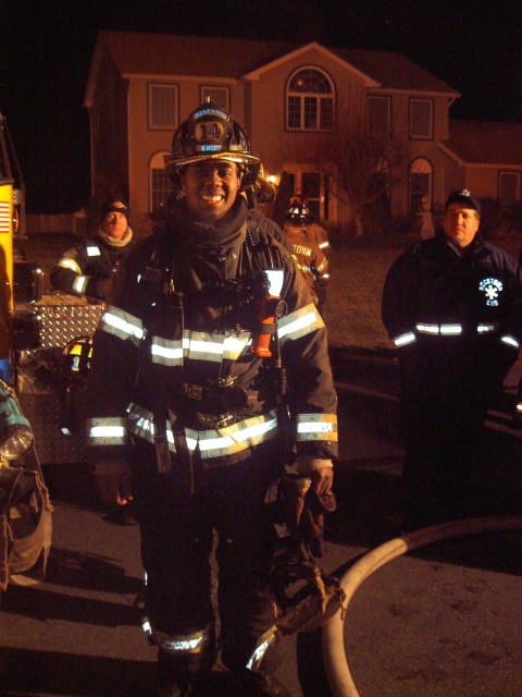 Firefighter Kyle Horton poses for a quick picture after overhaul at the Lower Nazareth dwelling fire.